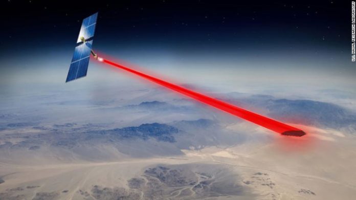 O conceito de um artista de um sistema de energia solar baseado no espaço transmitido para instalações militares e remotas.